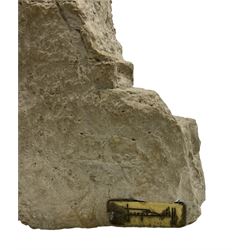 Composite sculpture embracing couple, after Joseph Bofill on a rocky base, height 33cm.