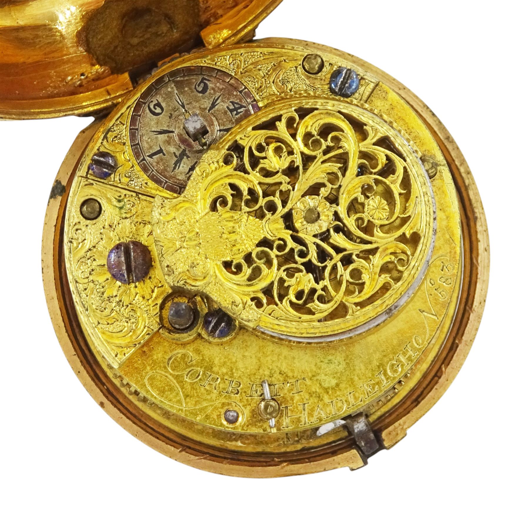 George III gilt and tortoise shell pair cased verge fusee pocket watch by Samuel Corbett, Hadleigh, No. 583, pierced and engraved balance cock, white enamel dial with Roman hours and outer Arabic minute ring, the tortoiseshell outer case painted with fern decoration
