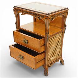 And So To Bed - pair of cherry wood and cane 'Libertine' bedside tables, glass top above a shaped and carved apron, with open recess above two drawers with brass handle, flanked by caned sides, raised on short cabriole supports 