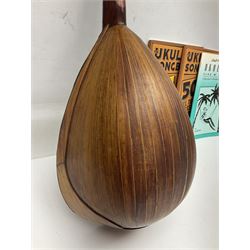 W.D. Keech banjolele pat.219720/23 with etched signature to the back; serial no.A12082 L55cm; and a restored Italian mandolin with segmented lute back; together with three music books