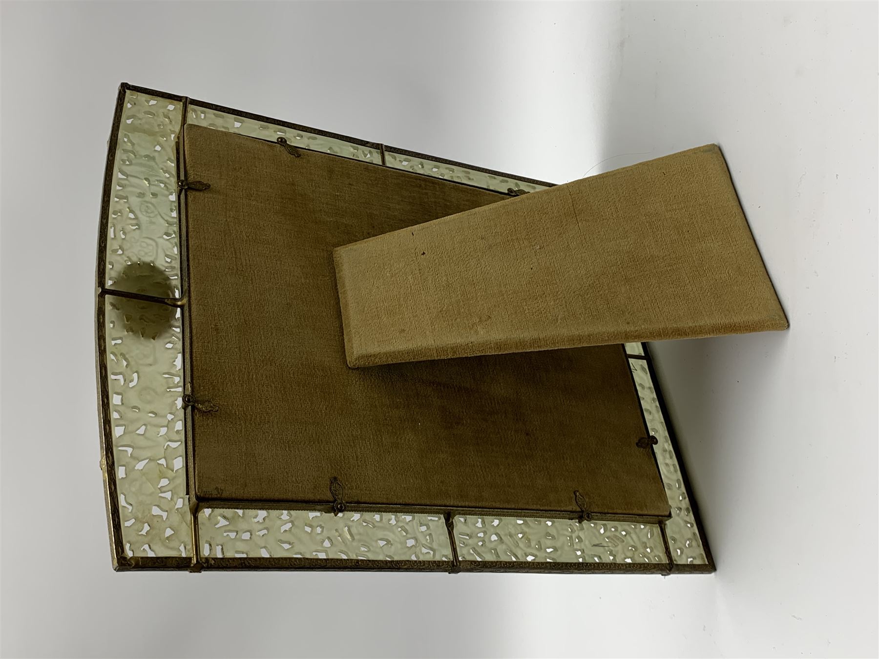 Early 20th century Chinese jade mounted photograph frame, of rectangular form the pierced jade frame carved with flowers and birds, the top panel carved with Foo dogs flaking an applied carved lavender coloured boss, with easel support verso, H33cm
