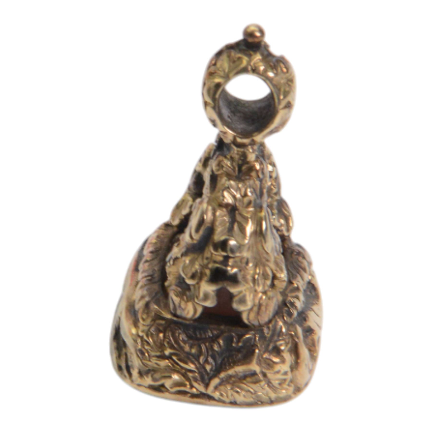Late 18th/early 19th century 12ct gold fob seal, the carnelian matrix engraved with the Chichester family coat of arms, depicting a chequy shield beneath a crest of a heron with an eel in its beak, within a scrolling foliate mount, the sides detailed with a hound in chase and birds, H3cm

Provenance: By family descent from the Chichesters of Arlington Court, Devon; from the collection of Andrew Chichester Everitt.

