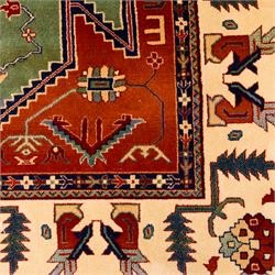 Late 20th century, French-made Caucasian design rug, woven with a dense pile, field decorated with a bold central stepped medallion flanked by stylized tribal and geometric motifs, borders of angular foliate designs in a palette of terracotta red with cotton fringe ends