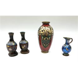 Pair of Chinese cloisonne vases on wooden stands H10cm, ovoid cloisonne vase H16cm and cloisonne jug H9cm