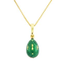 Fabergé 18ct gold enamel egg pendant, Ref. F-1310, green guilloche enamel egg, with hinged bail, designed by Victor Mayer for Fabergé, on 18ct gold wheat chain necklace, boxed with papers