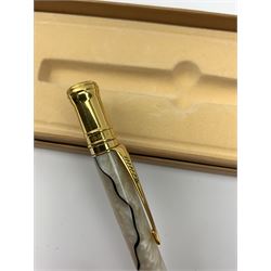 A group of pens, comprising Parker Duofold Centennial pearl and black ballpoint pen, Parker Frontier ballpoint pen, Ronson Penciliter, in original box, Parker Rialto fountain pen, and a further unmarked ballpoint. (5). 