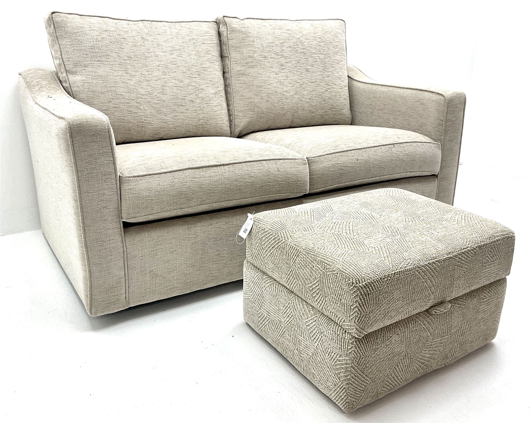 Two seat metal action sofa bed upholstered in a neutral fabric (W157cm) with storage stool (2)