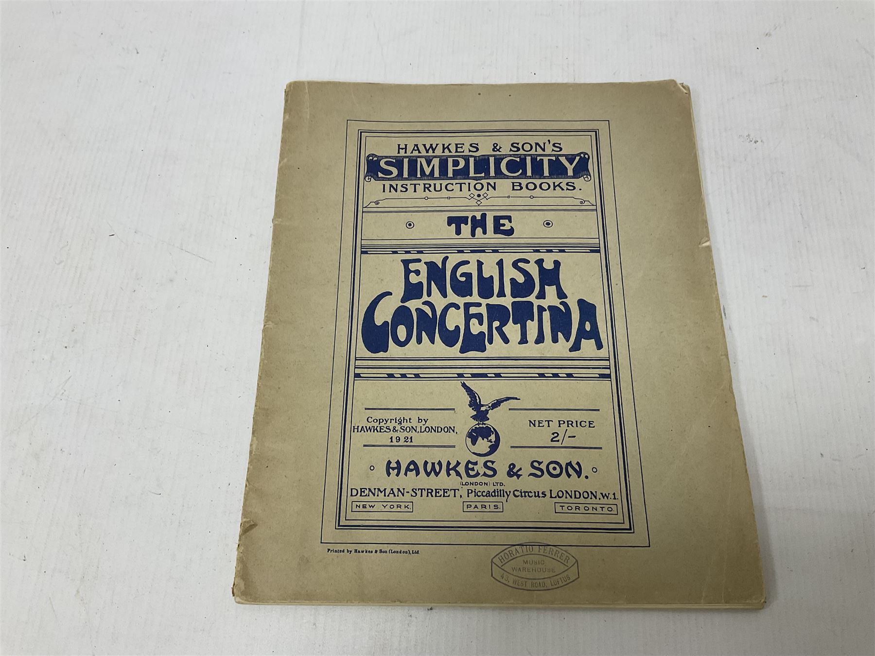 Three European concertinas, comprising Viceroy German concertina with 21 keys, hexagon wooden frame and 8 fold bellows
Oak framed concertina with 12 keys and 8 fold bellows
Commander concertina with 12 keys and 12 fold bellows
With tutor