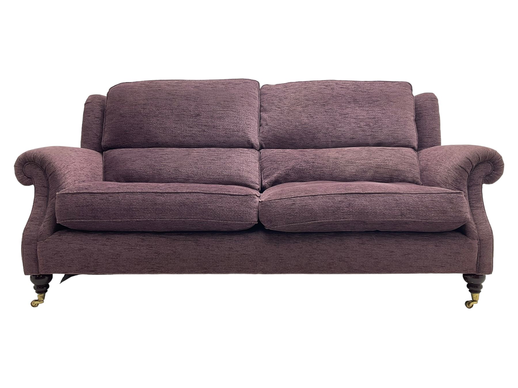 Parker Knoll pair of large twoseat sofas upholstered in purple