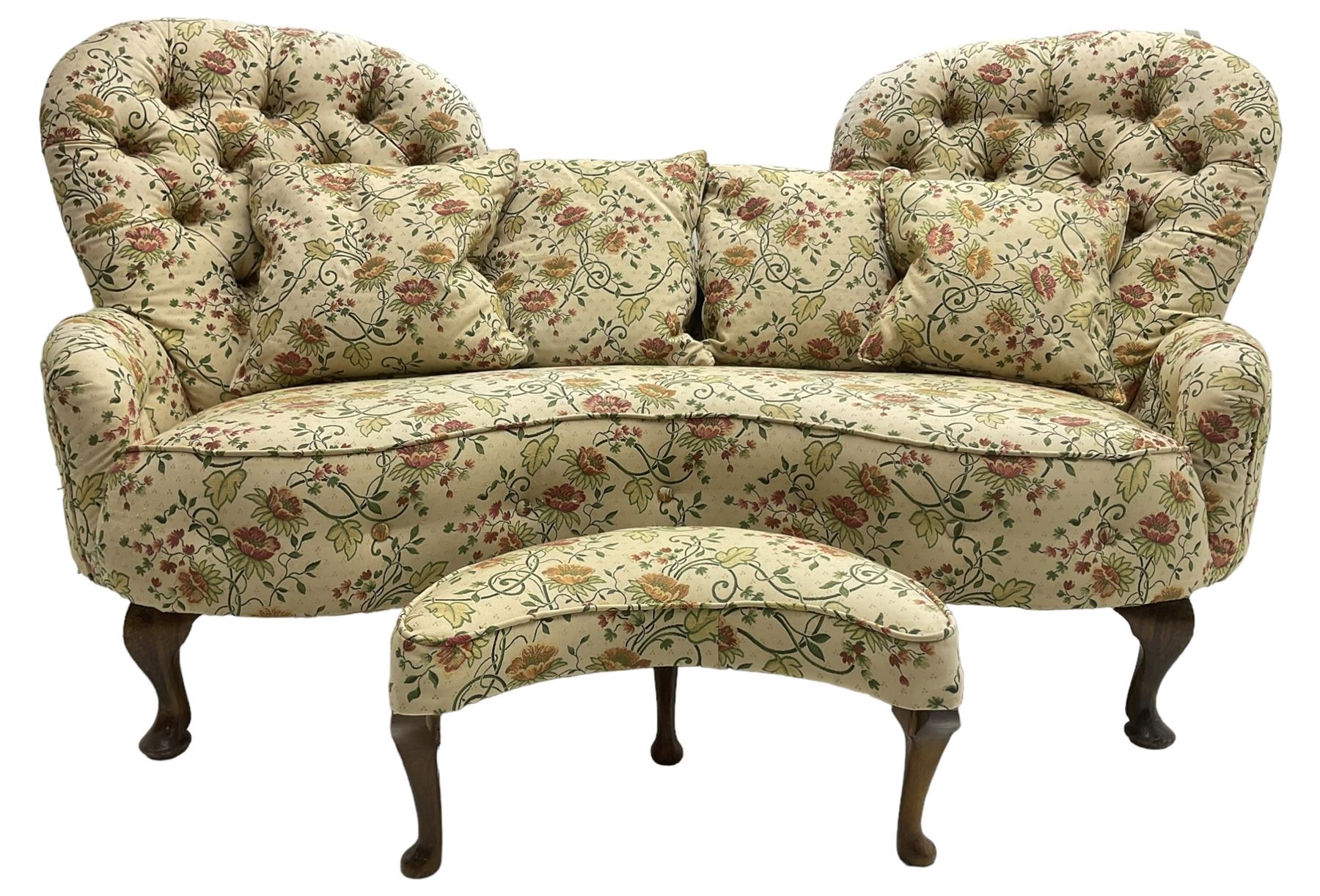 Victorian design hardwood-framed double back settee, upholstered in buttoned floral pattern fabric, curved back over serpentine seat, on cabriole feet, with matching scatter cushions (W182cm, H94cm, D86cm); together with crescent-shaped footstool with cabriole feet (W55cm)