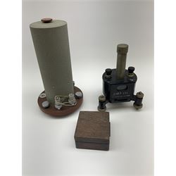 Two mirror galvanometers - one marked Sullivan Galvanometer serial no.1483/1950 of green crackled cylindrical form on circular base H24cm; the other by W.G. Pye & Co. Cambridge marked G107-131 on tripod base; together with an ammeter in wooden case (3)