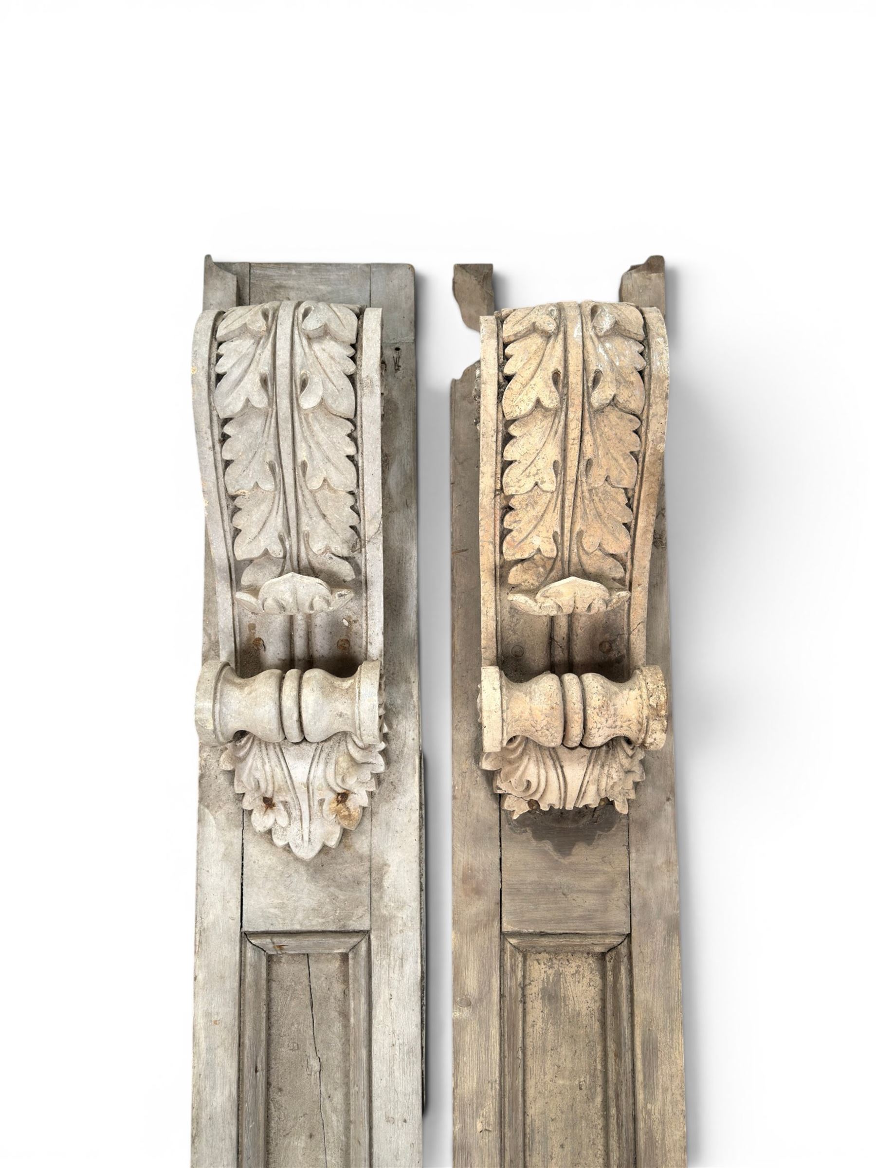 Pair of 19th century pine architectural pilasters, with painted terracotta capitols, with acanthus and scroll detail (18cm x 15cm x 57cm)