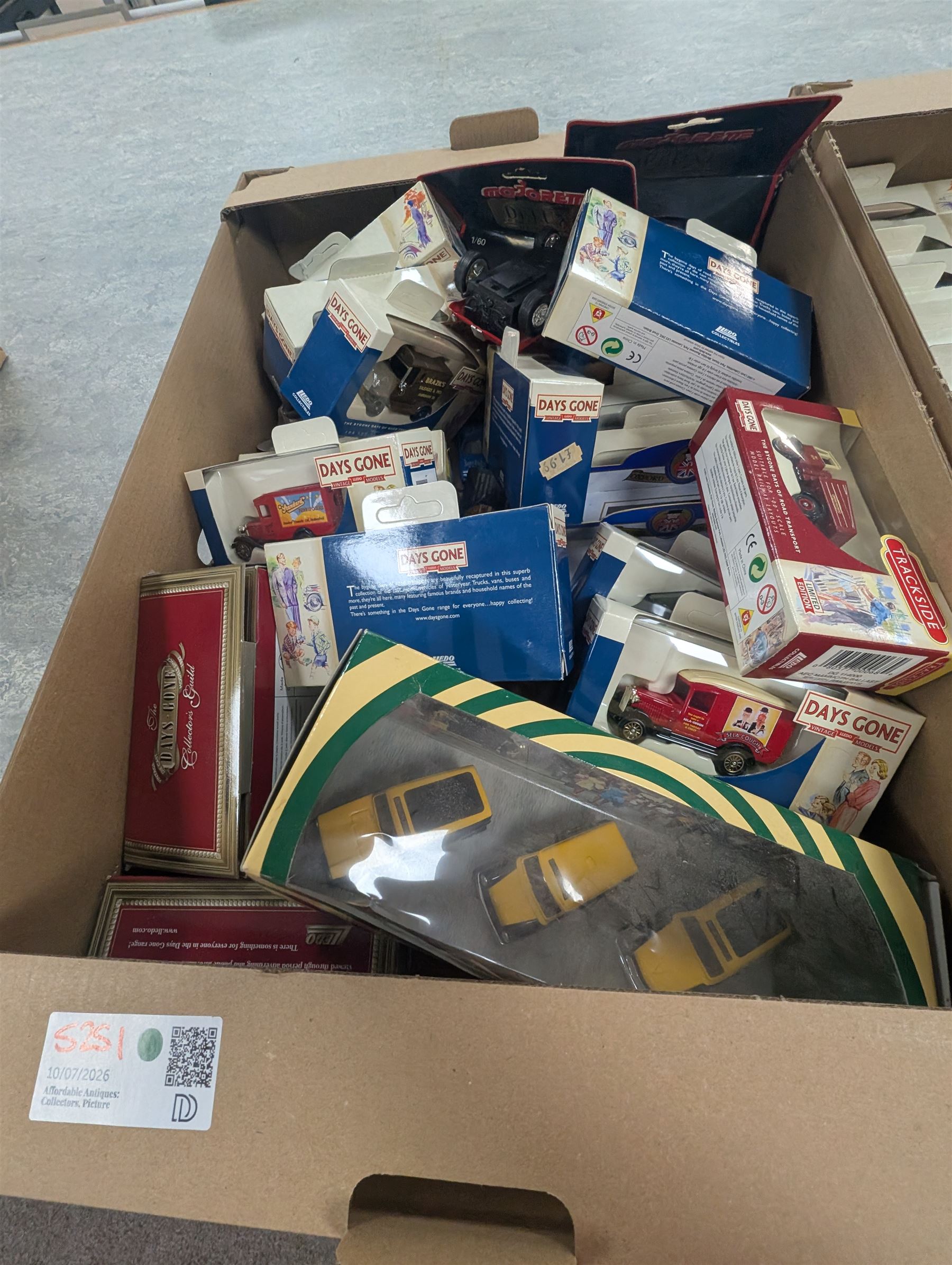 Collection of diecast model cars, incluidng Lledo Days Gone and Corgi examples, all boxed, in three boxes