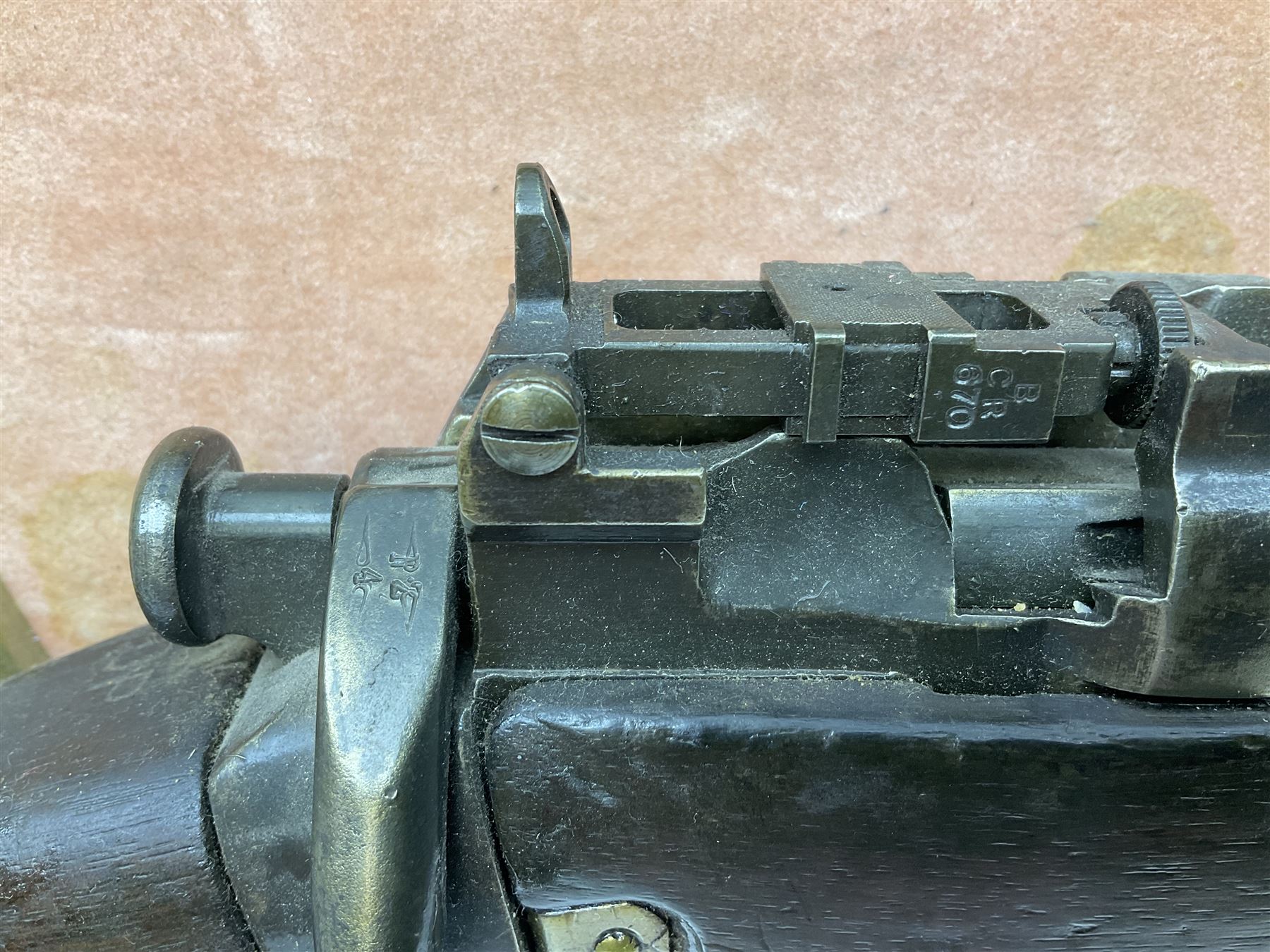 WW2 Lee Enfield No.4 Mk.1 .303 bolt-action rifle with hinged butt compartment, made by SA Ltd., Long Branch, Canada 1942, serial no.5L0646 L113cm; mounted on a framed display board with No.4 Mk.II spike bayonet, No.9 Mk.1 blade bayonet, two inert 5-round clips and brass biographical plaque by Antler Military Originals detailing DA Cert No.C3444 OLD STYLE DEACTIVATION SO FIREARMS CERTIFICATE REQUIRED OR RFD