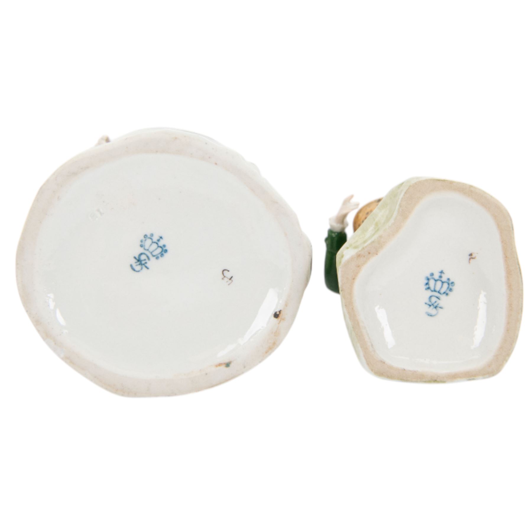 Five continental figures, including three Sitzendorf examples and a Rudolf Kammer example, tallest 20cm