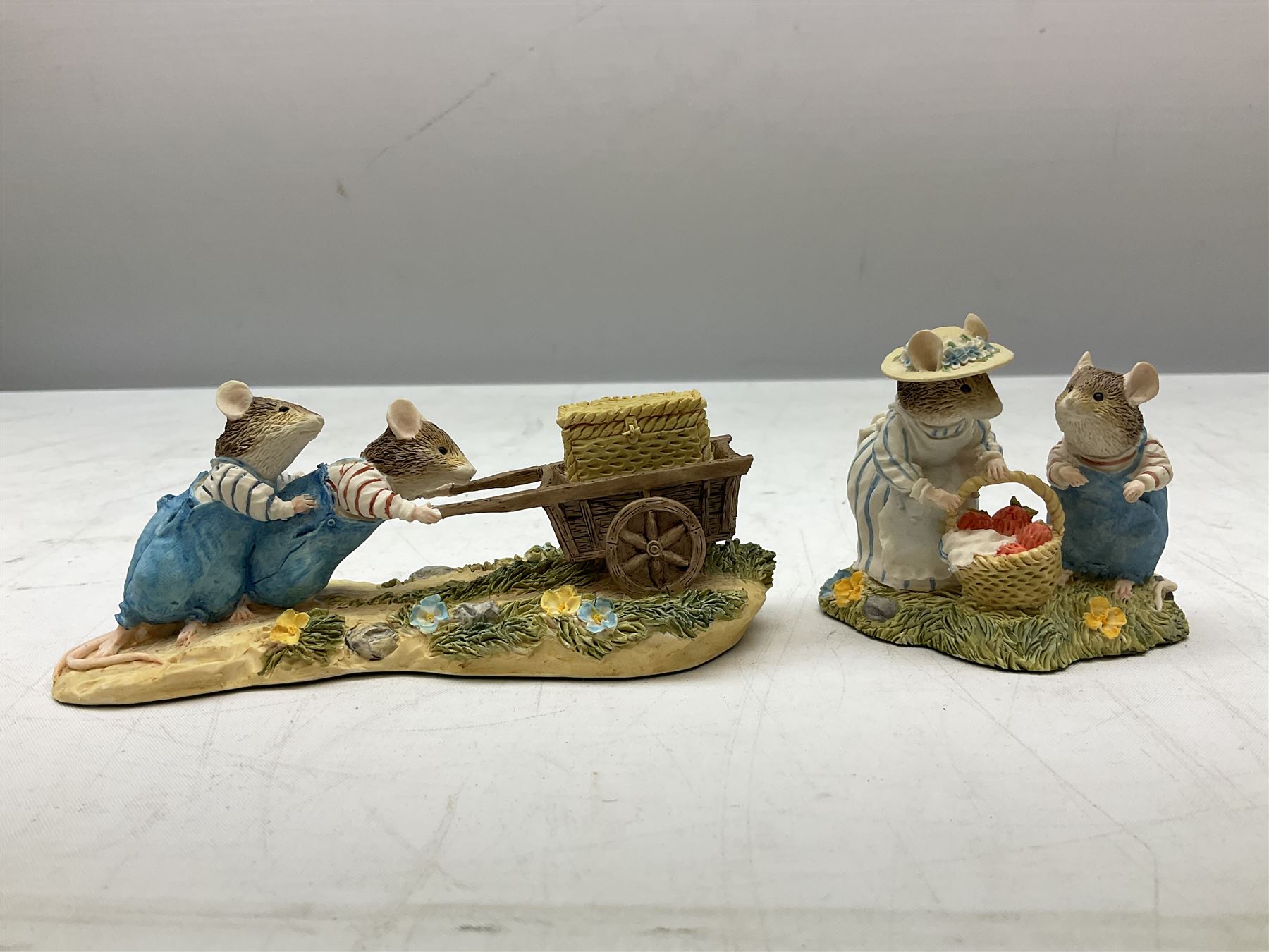 Four Classic Collectables Brambly Hedge figures, comprising Basil Pouring Drinks, Wilfred and Teasel Pushing Cart, Poppy Carry Pails and Mrs Apple, Wilfred and Basket, all boxed