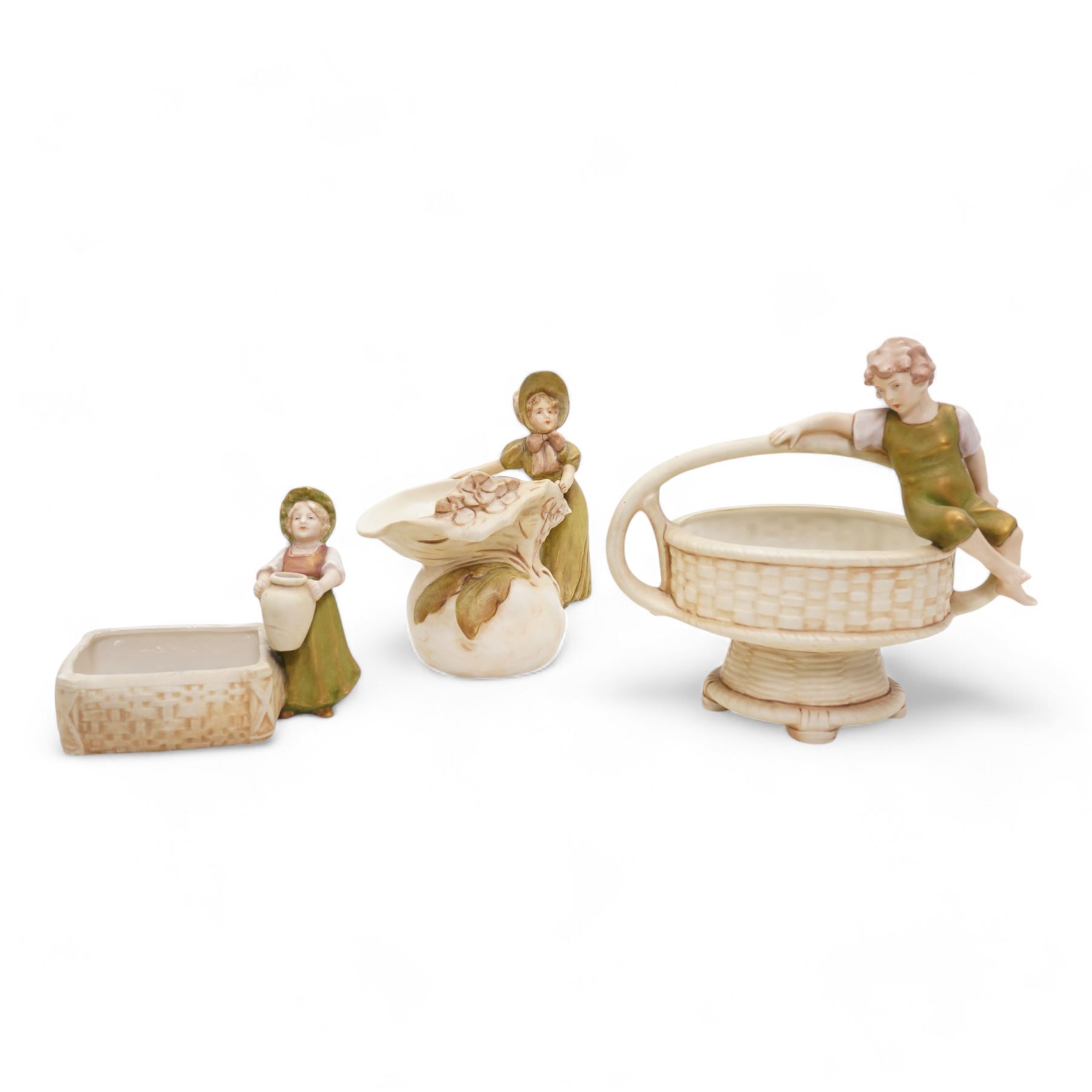 Royal Dux figural basket, modelled with a boy sitting upon the rim, H20cm, a Royal Dux figural trinket dish and a figural jug (3)
