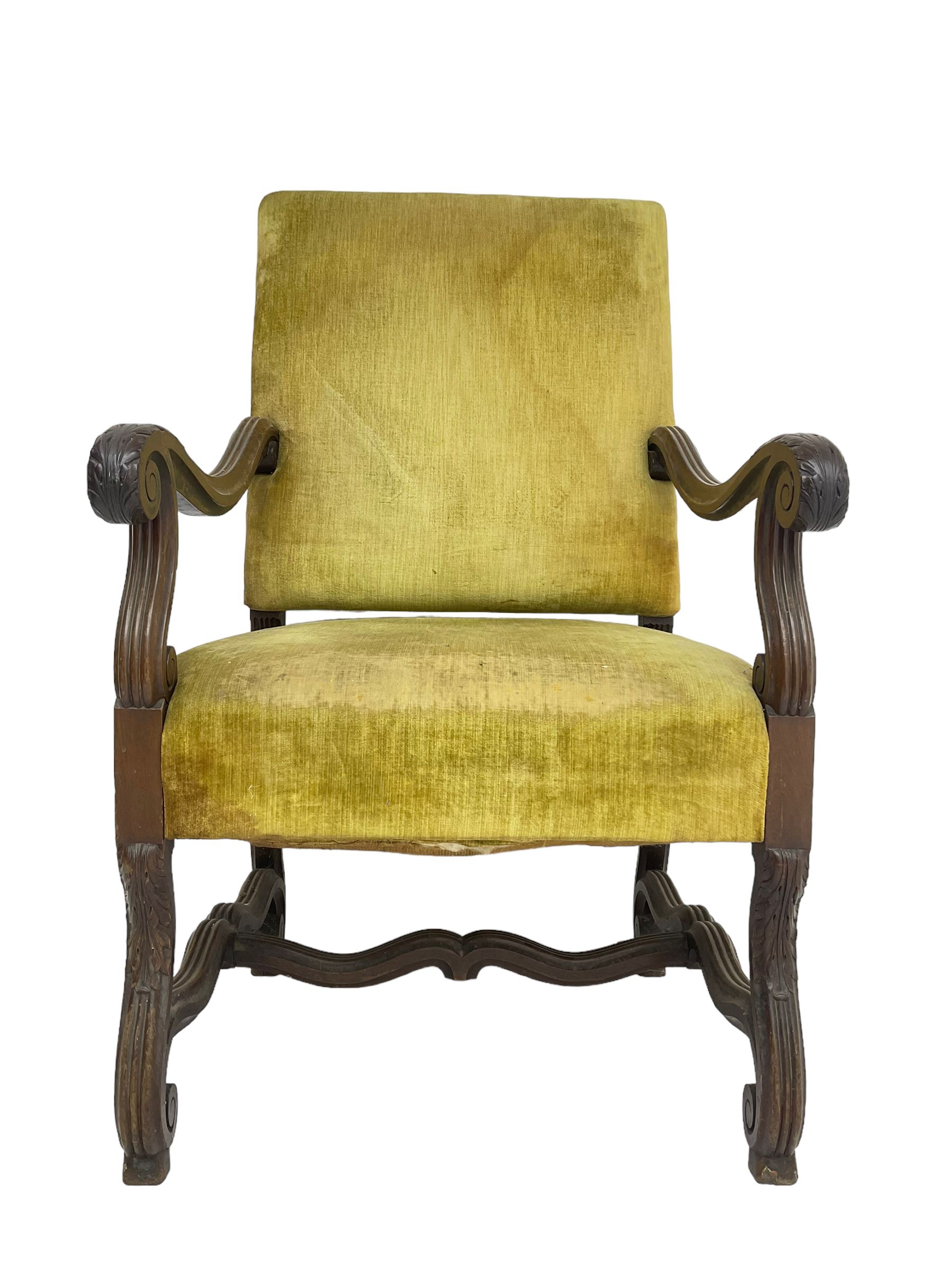 Early 20th century Carolean design mahogany framed throne chair, back and sprung seat upholstered in sage green fabric, scrolled amd reeded arms with carved oak leaf design, shaped supports with scroll feet united by waived stretchers