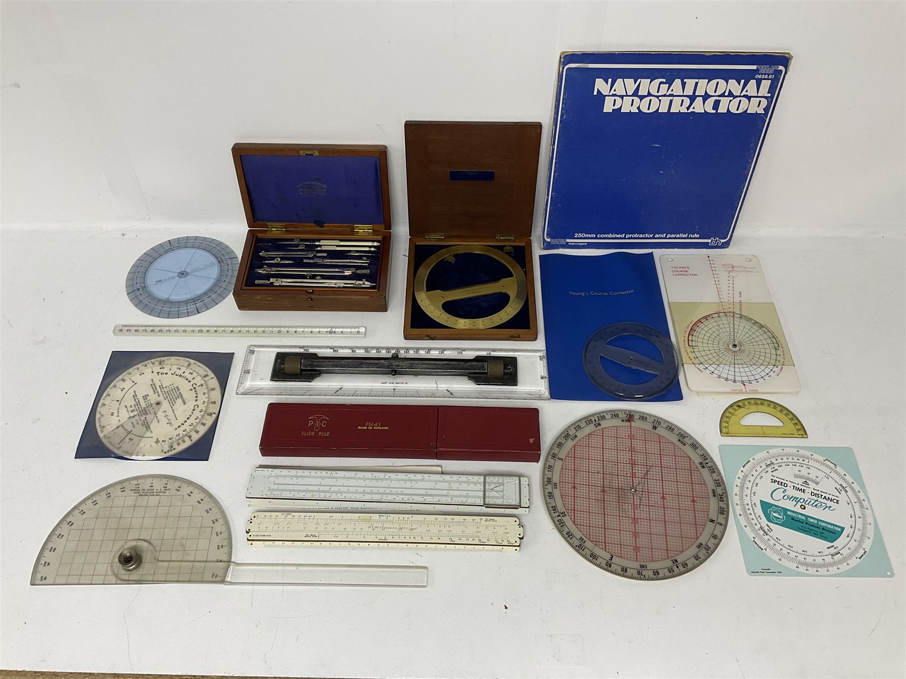 Brass 360 precision drafting protractor by Chadburn bros, in mahogany case, A G Thornton Drawing instruments in a mahogany case, together with P.I.C slide ruler, Nautical protractors etc 