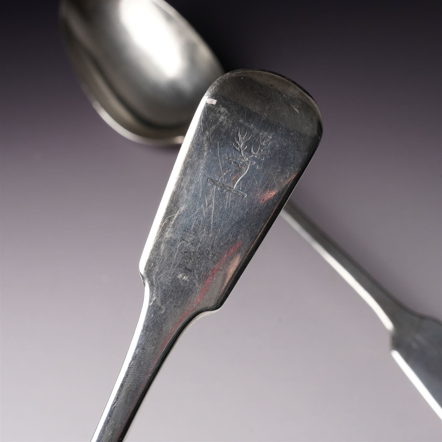  George IV silver fiddle pattern basting spoon engraved with monogram London 1827 Maker Clement Cheese and another London 1823 Maker George Turner (2)