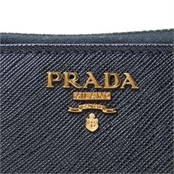 Prada - Saffiano Metal zip-around wallet, black Saffiano leather with gold-tone hardware and applied logo plaque, zip-around fastening with wrist strap and fitted interior, with authenticity card and original box