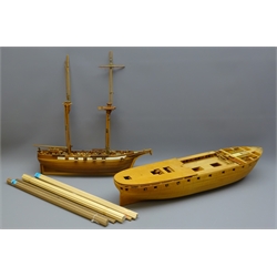  Two wooden 1:46 approx scale part finished kit models, one of a twin masted cargo ship, the other planked on frame, both de-rigged, and a qty of unused deck and hull planking, rigging, plans, etc, L64cm max  