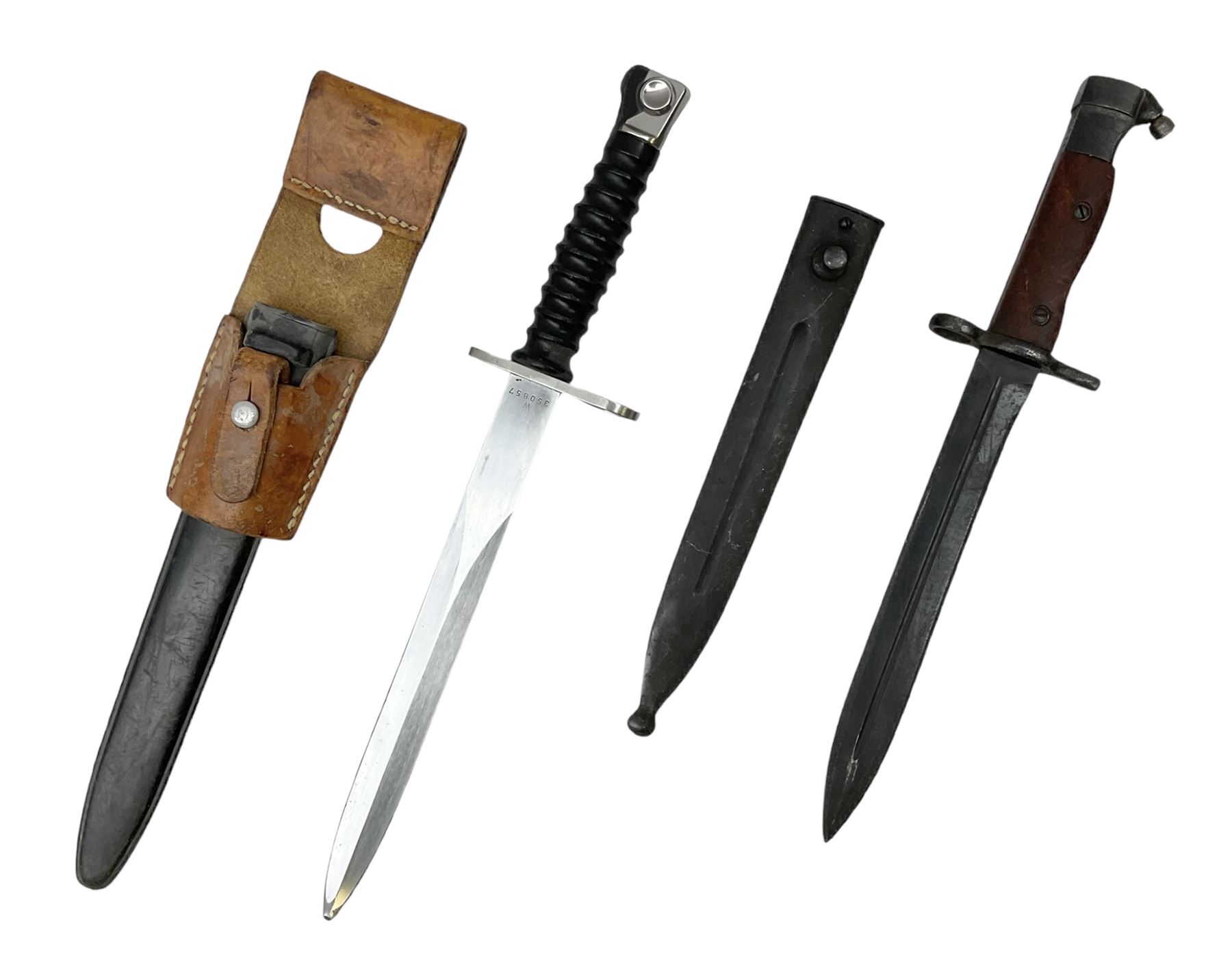Swiss Model 1957 SIG rifle bayonet by Wenger with 23.5cm steel blade numbered 350857; in plastic scabbard with leather frog stamped GSCH 85 L38cm overall; and Egyptian Hakim rifle bayonet with the same script number to the grip and steel scabbard (2)