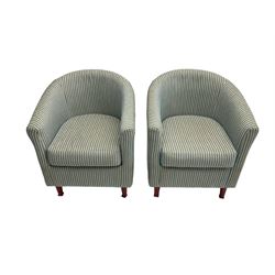 Pair tub armchairs, upholstered in blue striped fabric, raised on tapering supports
