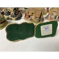 Twenty one Lilliput Lane models, including Blue Boar, Derwent-Le-Dale, Garden Guests and Chocolate Box Cottage, etc, some with deeds and boxes 