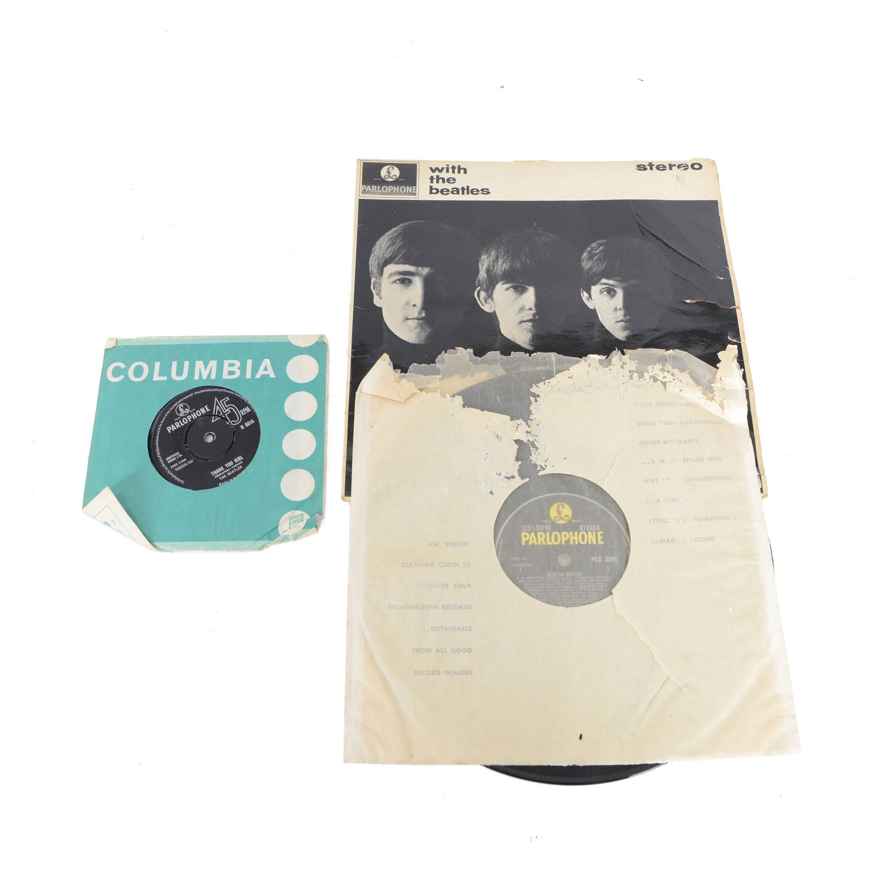 The Beatles 'With The Beatles' vinyl LP, UK Stereo Original, Parlophone PCS 3045, together with two Beatles 7