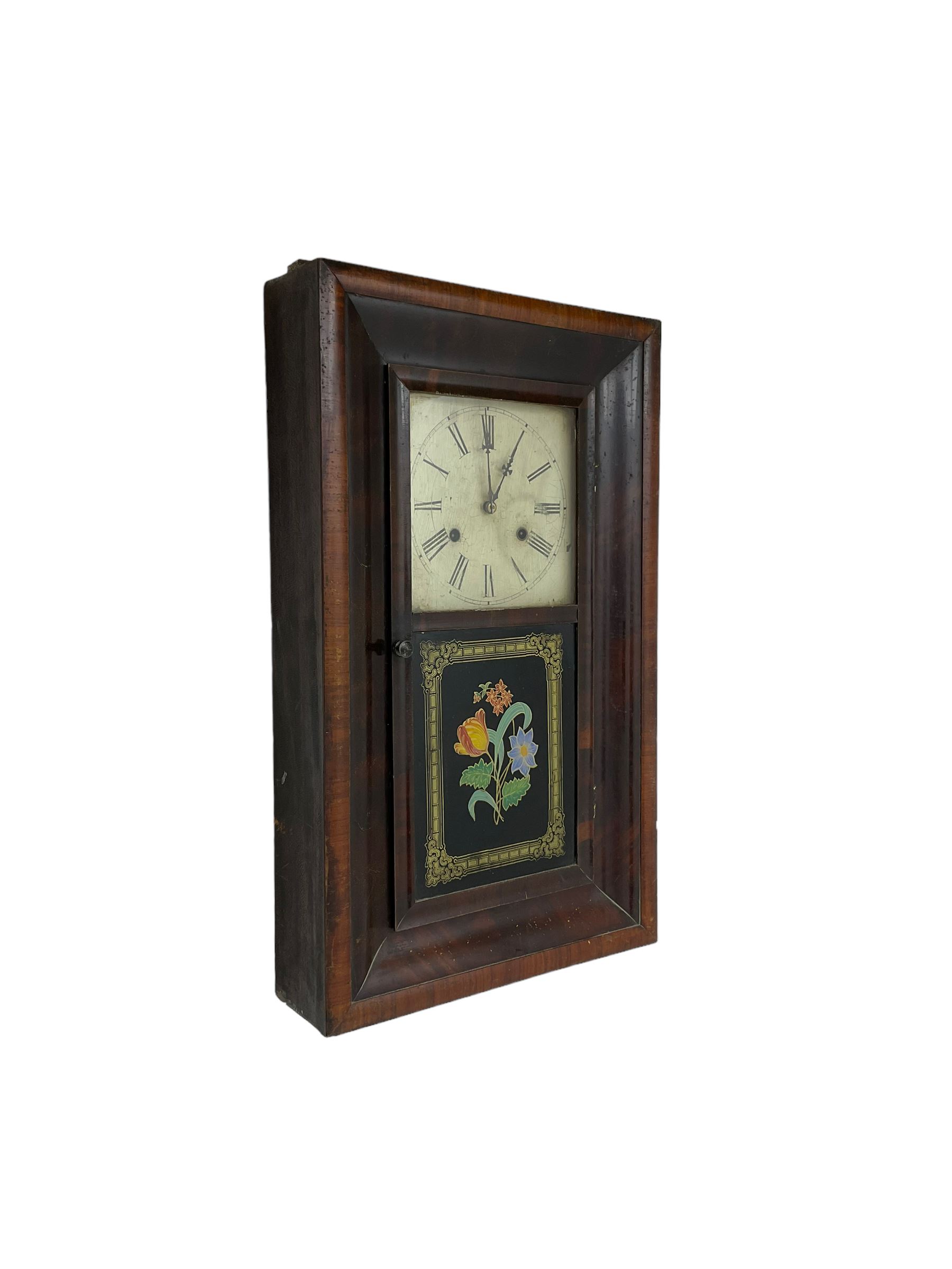 Jerome & Co - American late 19th century 30 hr weight driven mahogany wall clock, with deep ogee moulding and glazed door with a painted tablet,
Painted dial with Roman numerals and Maltese cross hands, twin train movement, striking the hours on a coiled gong. With weights and pendulum.
