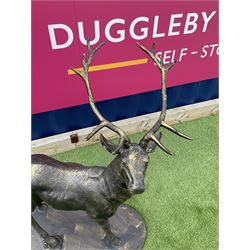 Bronzed cast iron life-size garden or indoor Stag, oval plinth base - THIS LOT IS TO BE COLLECTED BY APPOINTMENT FROM DUGGLEBY STORAGE, GREAT HILL, EASTFIELD, SCARBOROUGH, YO11 3TX