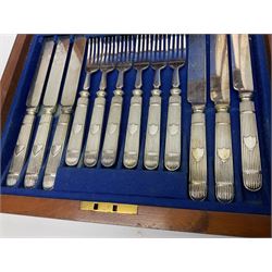 Victorian silver plated dessert set by Elkington & Co for twelve place settings, each reeded handle with vacant cartouche, each with Elkington & Co mark, date letter for 1861, and registration lozenge, contained within a mahogany case with vacant brass cartouche to the hinged cover, opening to reveal a Royal blue baize lined interior with removable tray, case H6cm W29.5cm D26.5cm