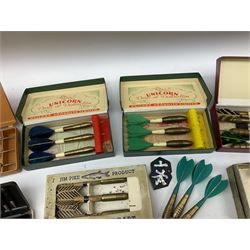 Nineteen sets of dartboard darts by Unicorn, Jim Pike, 'One-o-One', Farebrother etc, with various flights, shafts, styles and weights; predominantly boxed