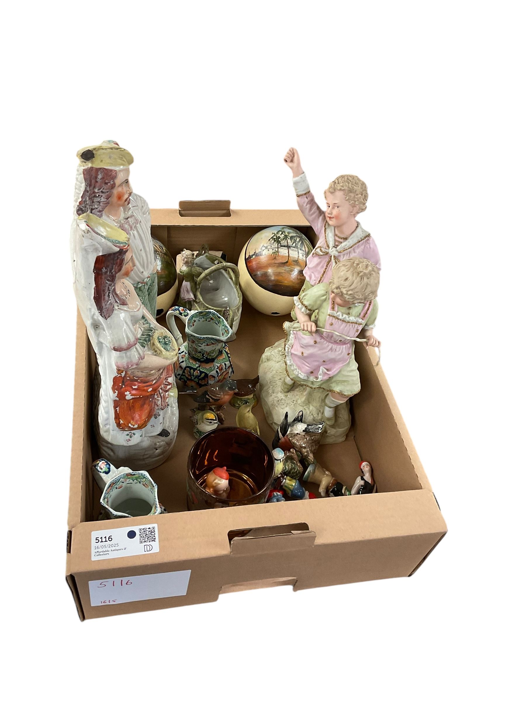 Two hand painted ostrich eggs, together with Staffordshire figure, lustre mug and other collectables 