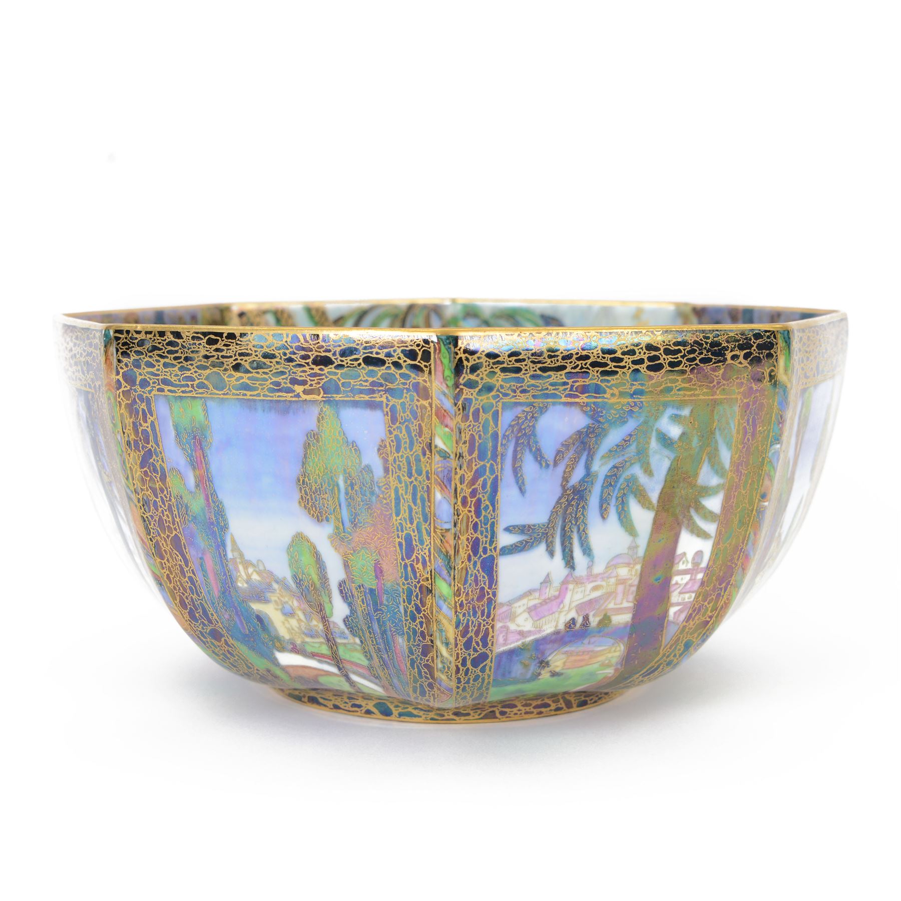 Early 20th century Wedgwood Fairland lustre bowl, circa 1920, of octagonal form, designed by Daisy Makeig-Jones, the exterior decorated in the Castle on the Road pattern, the interior decorated in the Fairy in a Cage pattern, pattern no Z5125, with printed marks beneath, H11cm D22.5cm
