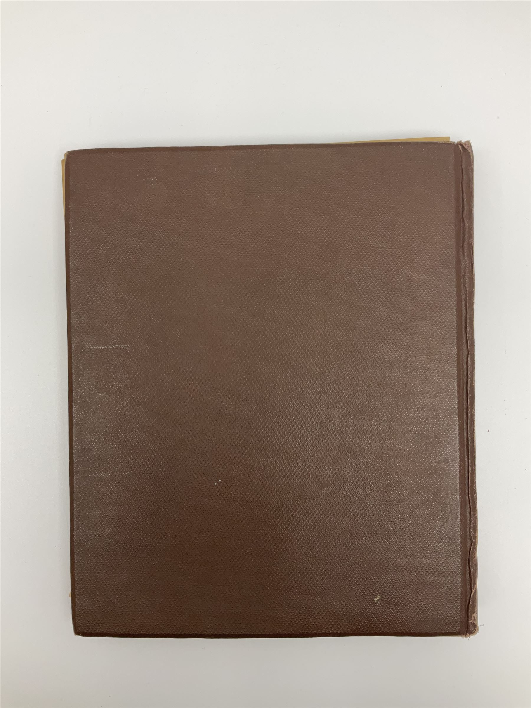 Album of WWII era paper ephemera, to include cartoon illustrations by George Goodwin Butterworth and Clive Uptton, articles and photographs