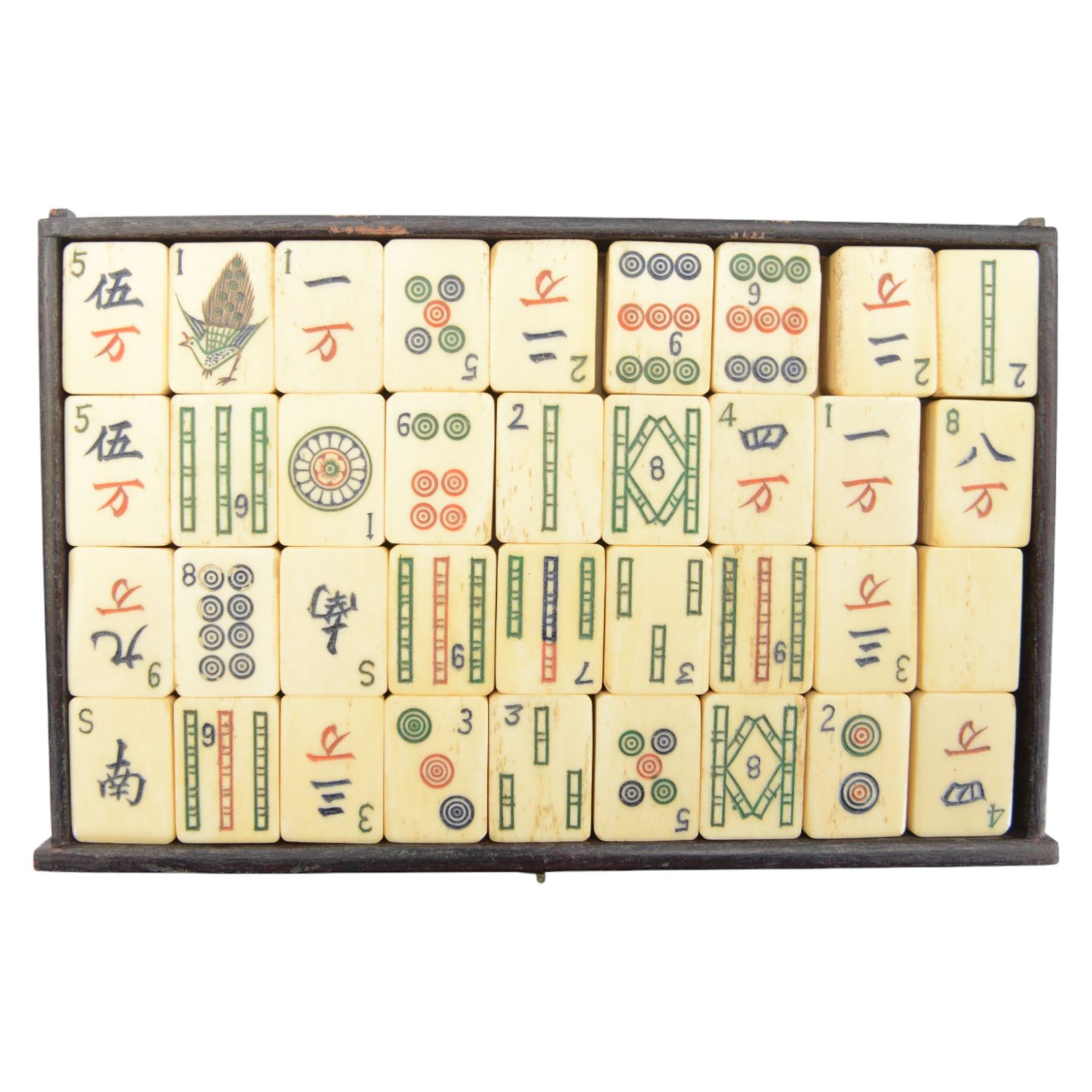 20th century Chinese Mahjong set, with five drawers containing bone counters and tiles, contained within a wooden box with brass detailing, together with a set of eight wooden Mahjong tile trays