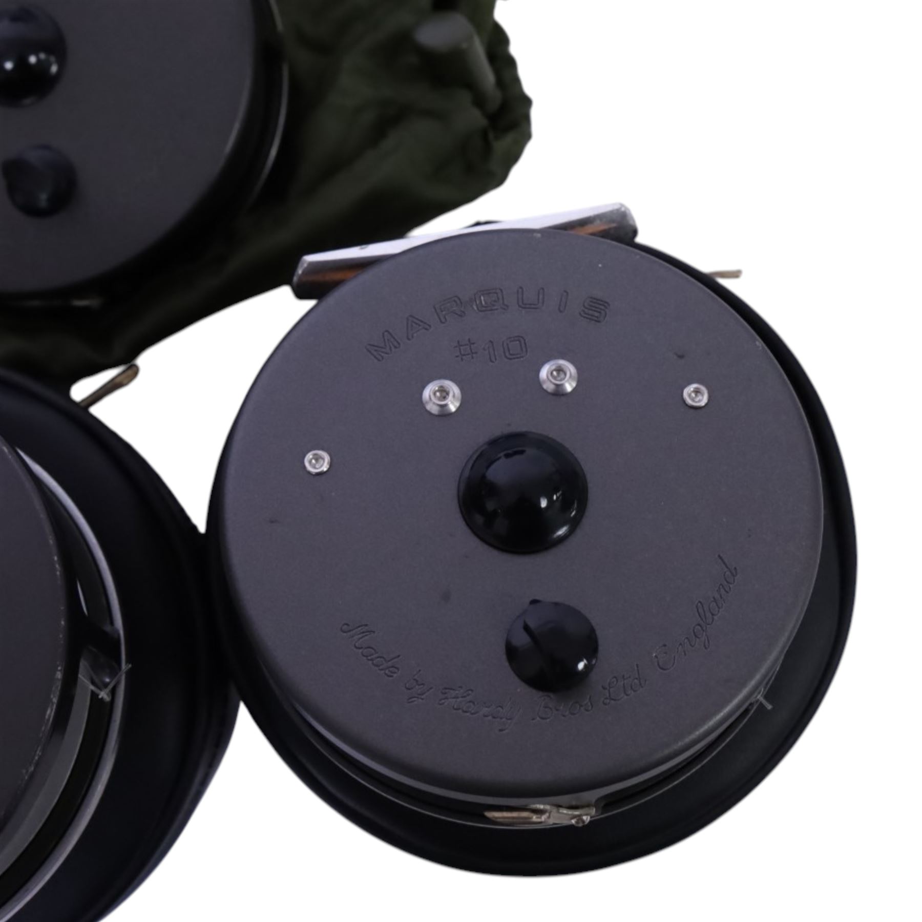 Three Hardy Bros Marquis fly fishing reels, comprising two No. 10 reels and a No.1 Salmon reel, two within black Hardy cases