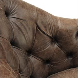 Georgian design tub-shaped club armchair, upholstered in back-buttoned dark tan leather with sprung seat, raised on square tapering supports with brass cups and castors