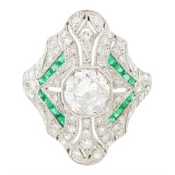 Platinum emerald and diamond cluster ring, the principal transitional cut diamond of 0.99 ...