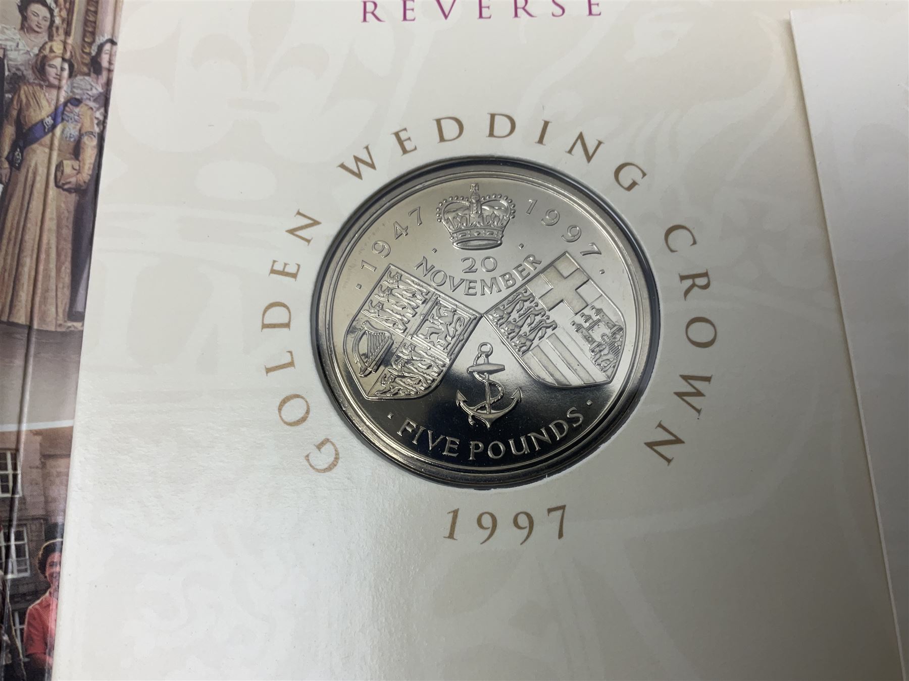 The Royal Mint United Kingdom 1984 brilliant uncirculated coin collection, 1997 and 2001 commemorative crown coins, 1997 old round one pound, all in card folders and four sterling silver medallic first day covers from the 'Great Britons' collection housed in a blue folder