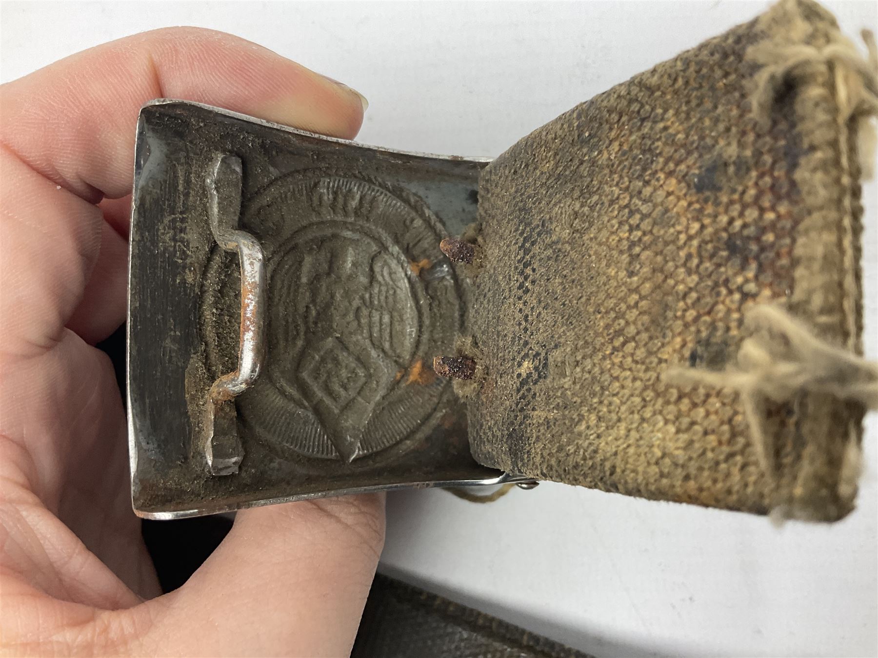 WW2 German Hitler Youth belt, the buckle marked 'Blut Und Ehre' and impressed RZM M/4/55 verso; and another Hitler Youth belt with similarly marked buckle (2)