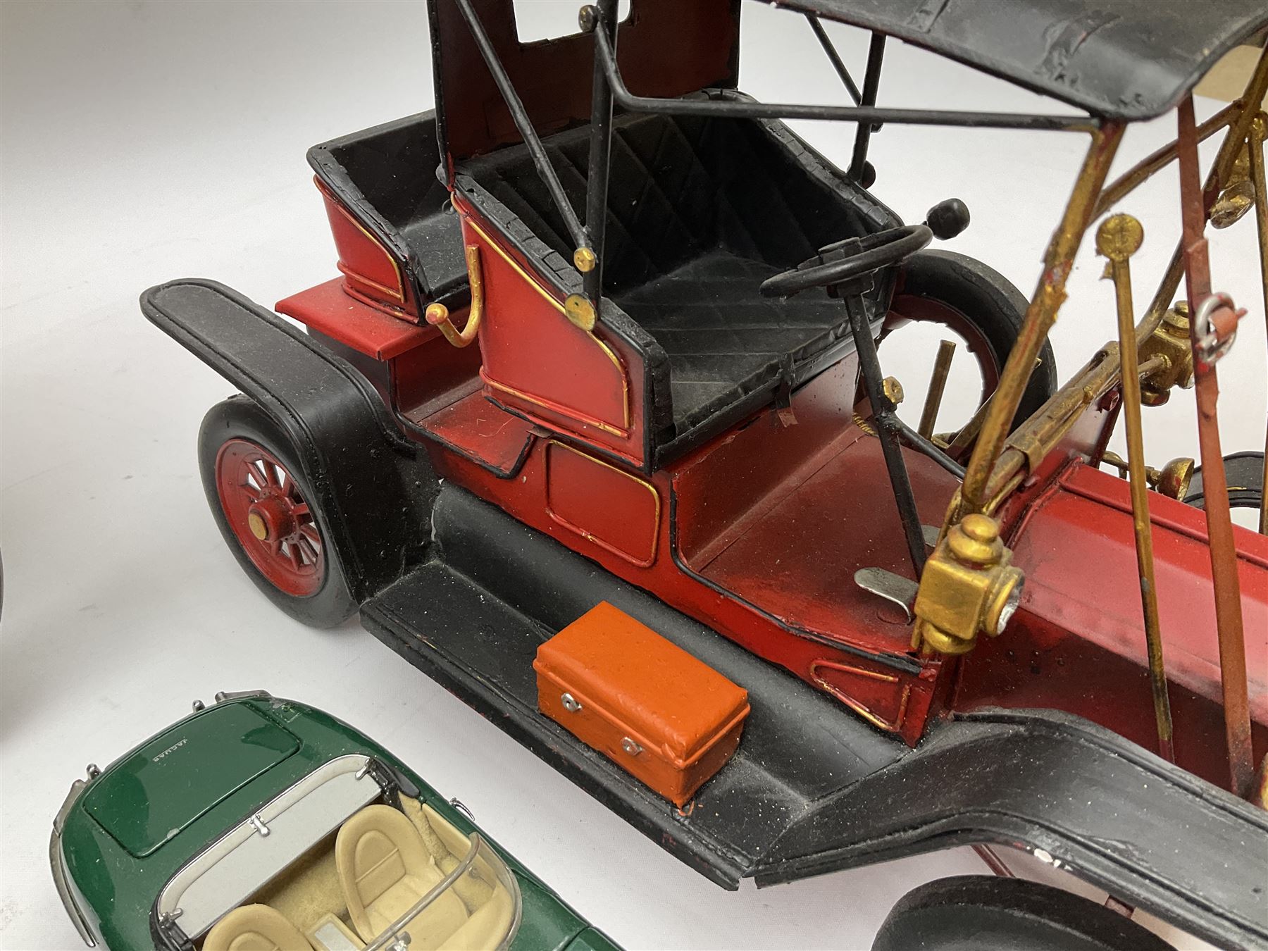 Four Franklin Mint Precision Models, one with hardwood body; large reproduction model of a vintage racing car L52cm; and four other modern metal/wooden models of vintage cars; all unboxed (9)