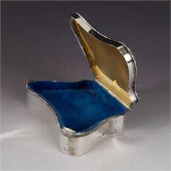 Early 20th century silver mounted jewellery box, with curved front and embossed palmette rim, opening to revel padded interior with weighted base, hallmarked A & J Zimmerman Ltd, Birmingham 1911, H3cm, W11cm