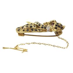 9ct gold sapphire cheetah brooch, with ruby eyes and a diamond set collar, Birmingham 1989