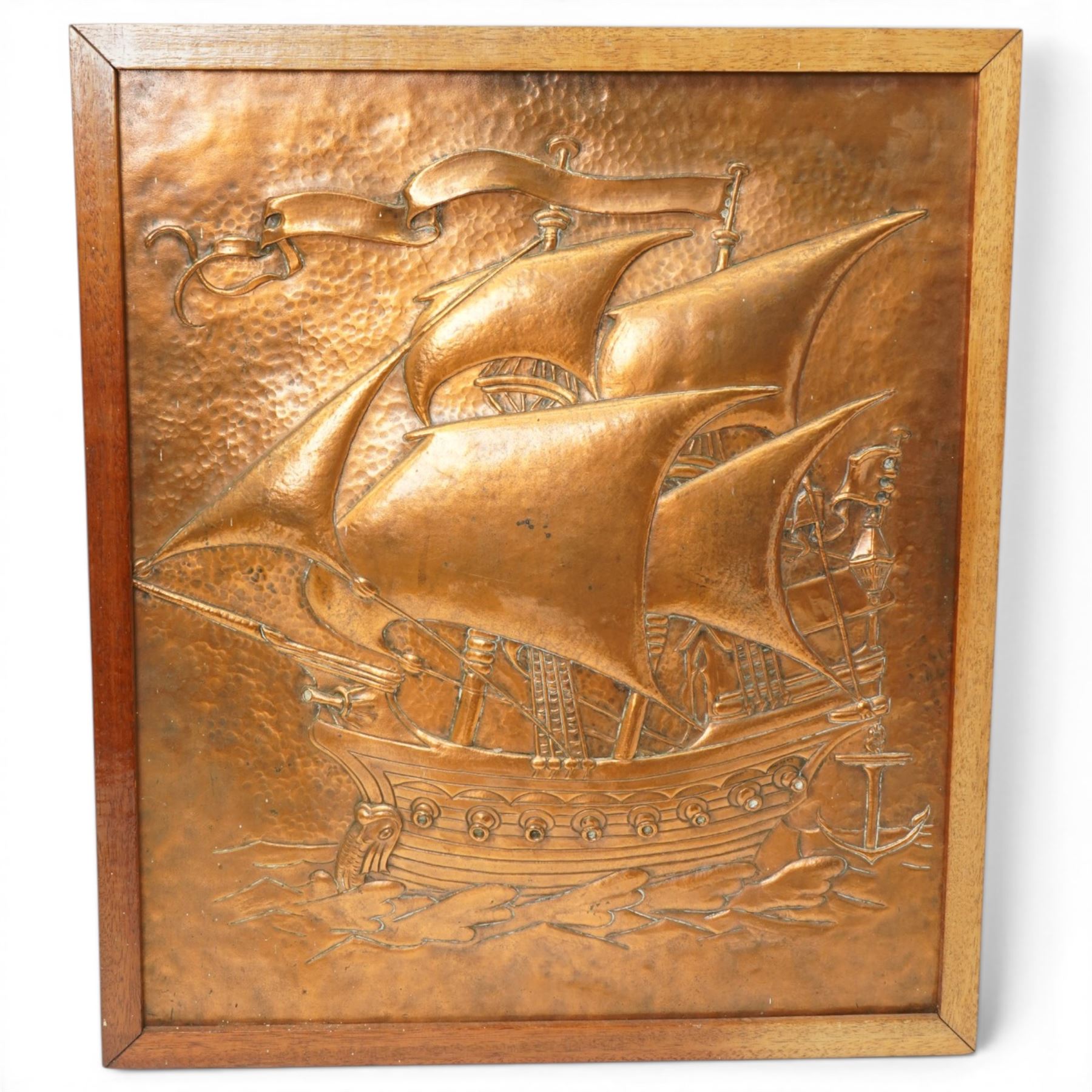 Arts and Crafts Newlyn style copper panel with repousse decoration of a sailing ship 46cm x 39cm, frames, 19th century copper coal helmet, brass coal helmet and brass jug
