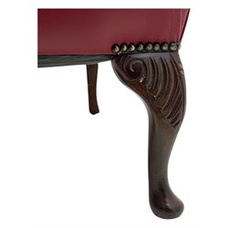 Kingsgate - contemporary 'Queen Anne' wingback armchair with matching stool, high back with deep button tufting, upholstered in red leather with brass stud trim, on carved cabriole supports