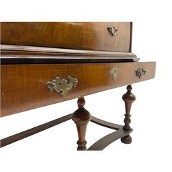 18th century and later walnut chest on stand, the chest fitted with cushion frieze drawer over two short and three long drawers, the stand fitted with single long drawer, raised on turned supports joined by shaped stretcher rails
