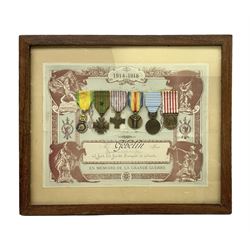 Six WW1 French medals comprising Valor Discipline 1870 3rd Republic Military Medal, Croix De Guerre with star, Croix Du Combattant, Medaille Inter-Alliee De La Victorie, Orient Medal and Medaille Commemorative De La Grande Guerre 1914-18; all with ribbons; mounted, framed and glazed with certificate named to Mr. Gebelin Herve Brigadier au 4th Chassrs. D'Afrique
